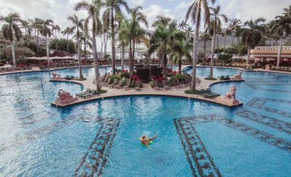Family enjoying beach holiday with kids – perfect for family holiday packages and holiday activities